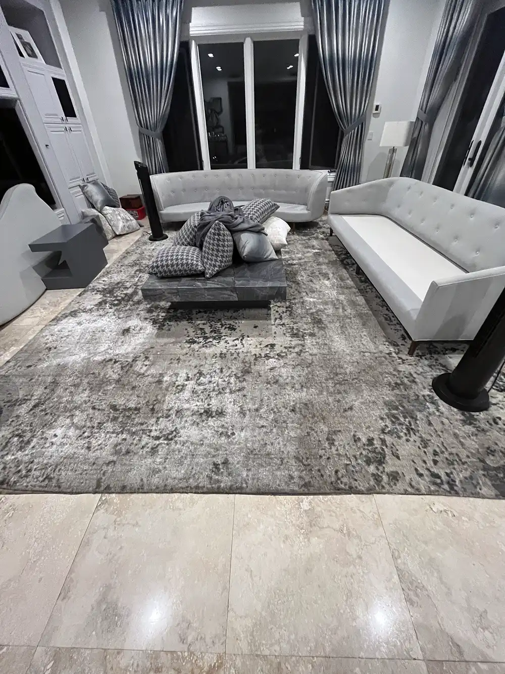 Professionally cleaned area rug and upholstered furniture in a Los Angeles home